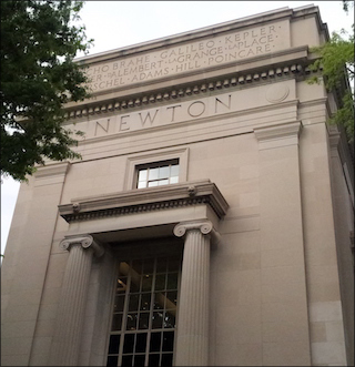 A photo of a building with the word "Newton" engraved on the side. A photo of a building with the word "Newton" engraved on the side.