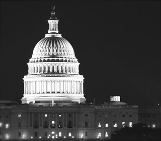 Black and white photo of U.S. Capitol at night. Black and white photo of U.S. Capitol at night.
