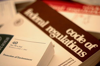 Photograph of government environmental regulation books. Photograph of government environmental regulation books.