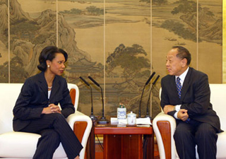 A photograph of Secretary Condoleezza Rice meeting with Chinese Foreign Minister Li Zhao Xing. A photograph of Secretary Condoleezza Rice meeting with Chinese Foreign Minister Li Zhao Xing.
