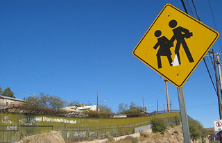 Roadside sign at the U.S.-Mexico border. Roadside sign at the U.S.-Mexico border.