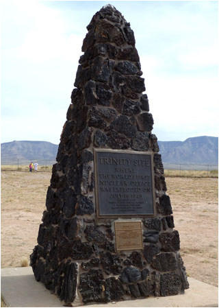 A large triangular structure made of jagged stone rests on an empty plain. A large triangular structure made of jagged stone rests on an empty plain.