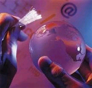 Photo of hands holding a globe and fiber optic cables. Photo of hands holding a globe and fiber optic cables.