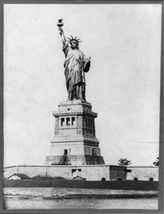 A black and white photograph of the Statue of Liberty. A black and white photograph of the Statue of Liberty.