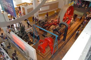 An image of a 1903 Burnley Ironworks Company, Stationary Engine, a corliss steam engine, on display at the London Museum of Science. An image of a 1903 Burnley Ironworks Company, Stationary Engine, a corliss steam engine, on display at the London Museum of Science.