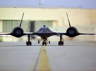 A stealth jet speeding down the runway. A stealth jet speeding down the runway.