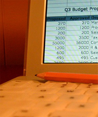A close-up of a pencil sitting on top of a latop. A close-up of a pencil sitting on top of a latop.