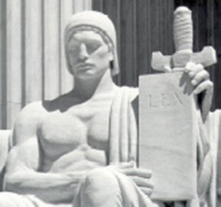 A statue of a man holding a law tablet. A statue of a man holding a law tablet.