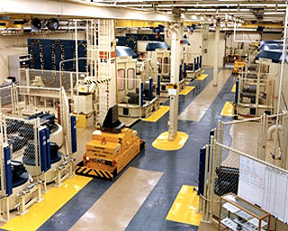A photograph of a manufacturing center. A photograph of a manufacturing center.