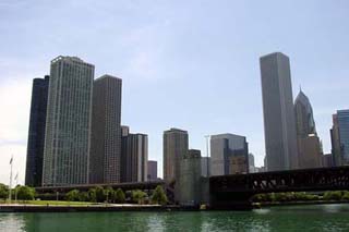 Photo of skyscrapers against a blue sky. Photo of skyscrapers against a blue sky.