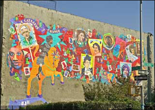 A colorful mural on the side of a building portrays 90 female activists throughout history. A colorful mural on the side of a building portrays 90 female activists throughout history.