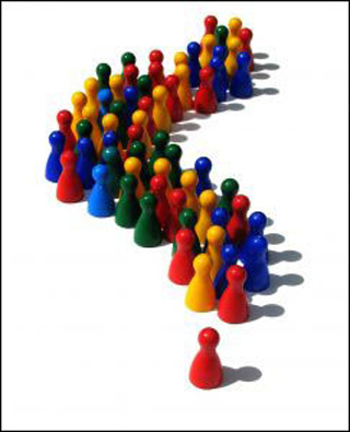 A red figure stands alone in front of a group of multicolored figures. A red figure stands alone in front of a group of multicolored figures.