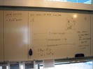Notes on a whiteboard about cluster depth.